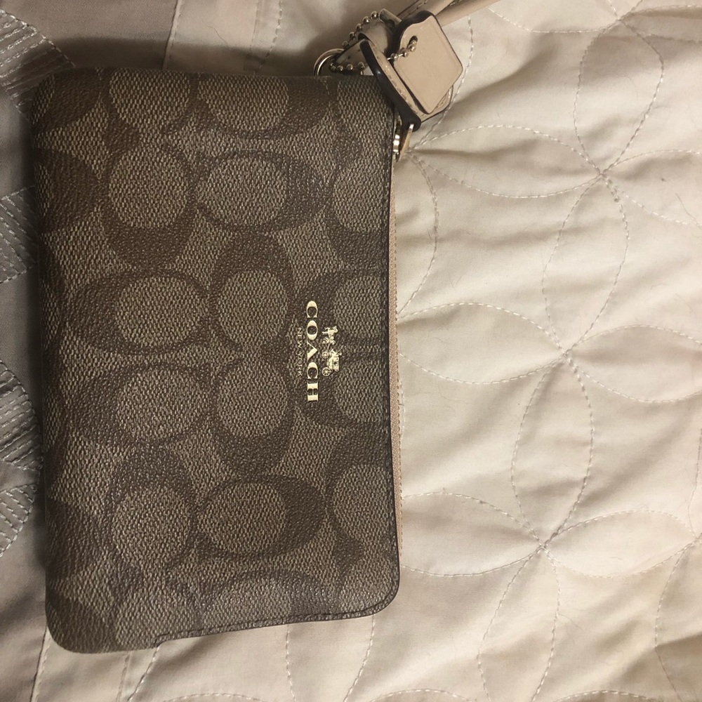 Small Coach wristlet.
